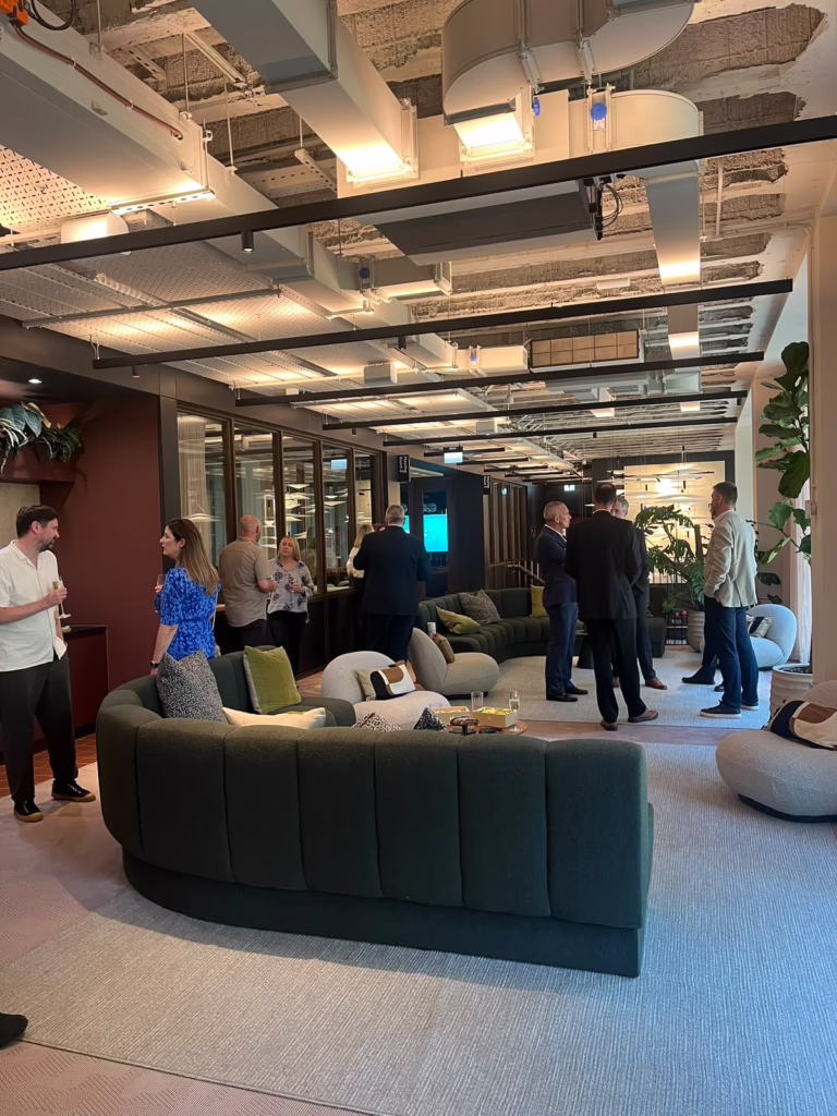 Guests networking at a corporate catering event